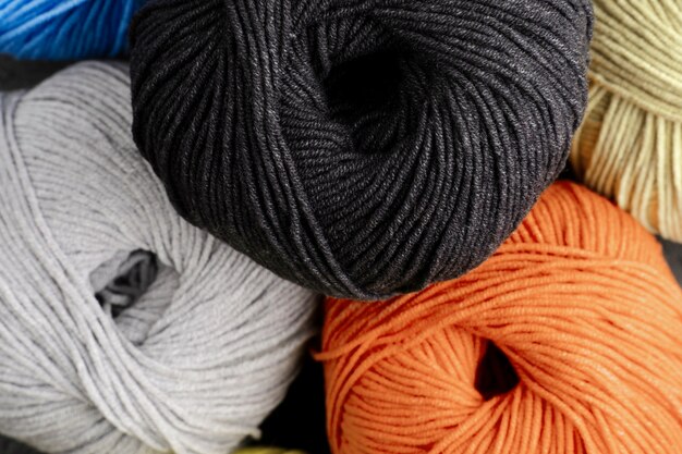 Black, orange and white wool yarn