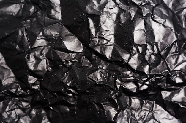 Free Photo black paper texture with copy space