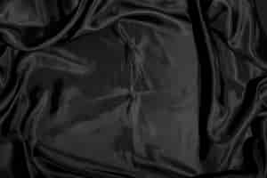 Free photo black silk fabric texture background