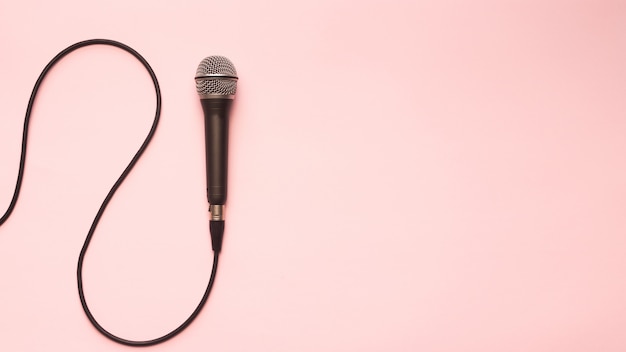 Black and Silver Microphone On a Pink Background