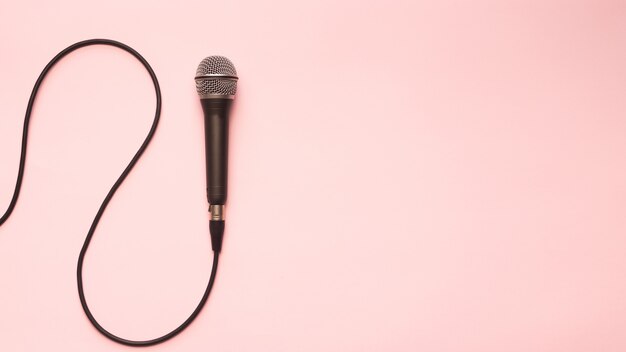 Black and Silver Microphone On a Pink Background