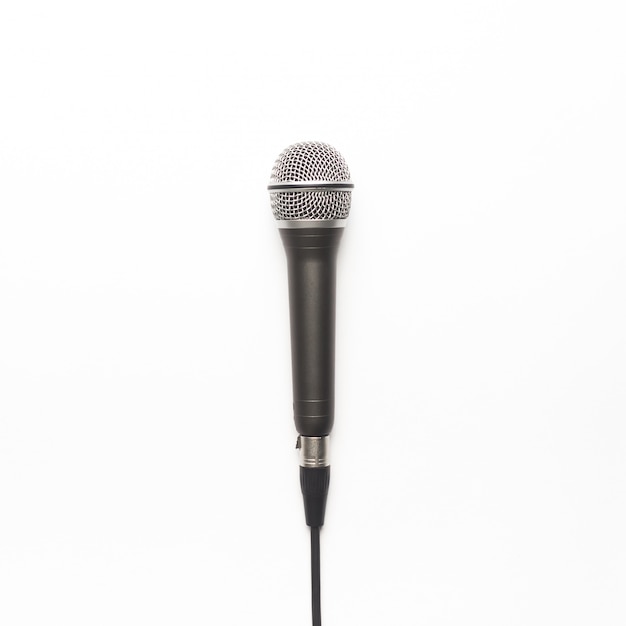 Free photo black and silver microphone on a white background