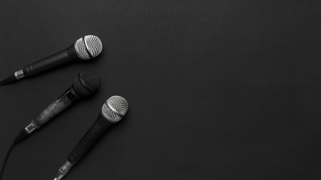 Black and Silver Microphones On a Black Background