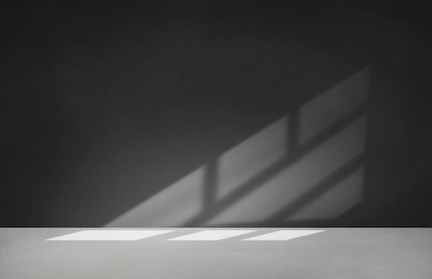 Free photo black wall in an empty room with concrete floor