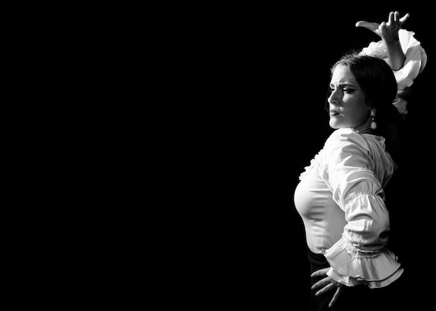 Free Photo black and white flamenca with arm up and copy space