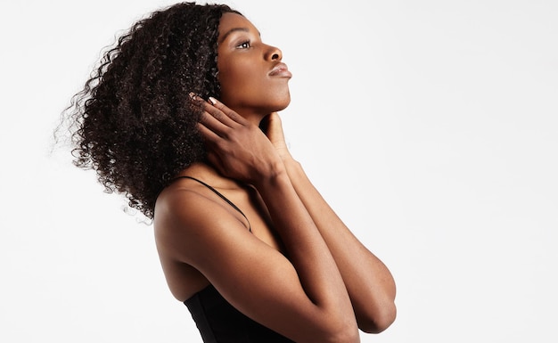 Black woman closeup portrait wears curly afro hair