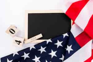 Free photo blackboard and usa flag on white background