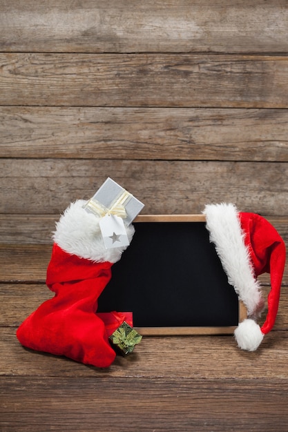 Free Photo blackboard with a hat santa claus