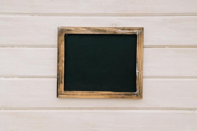 Free photo blackboard with wooden frame