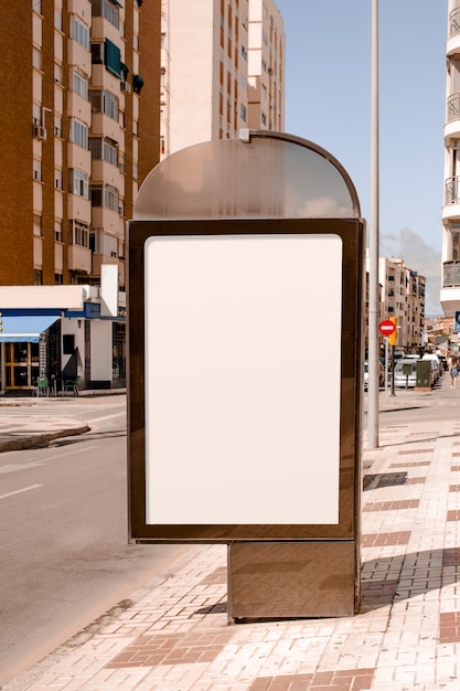 Free photo blank advertising stand near the street in the city