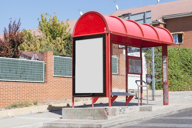 Free Photo blank billboard at bus stop by the road in the city