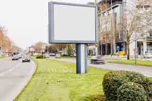 Free photo blank billboard on road in city