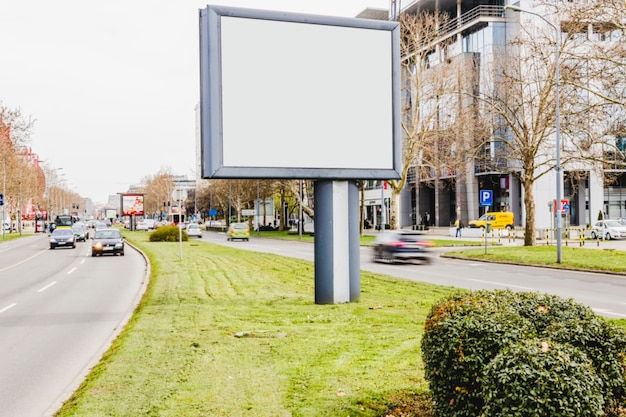 Free Photo blank billboard on road in city