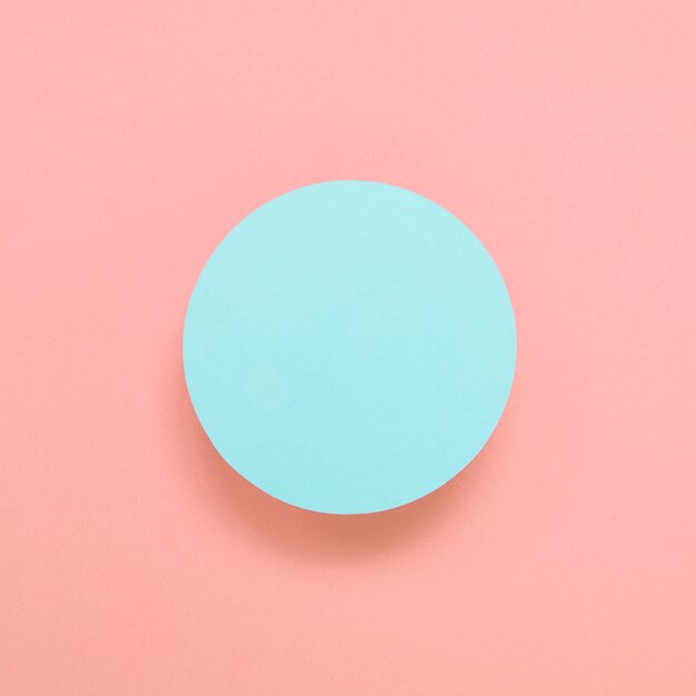 Blank blue circular frame on colored background