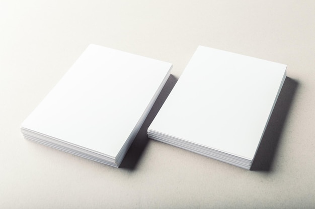 Blank business cards on grey background