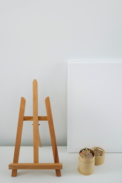 Free photo blank canvas for painting indoors still life