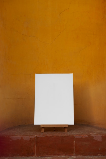 Free photo blank canvas for painting indoors still life