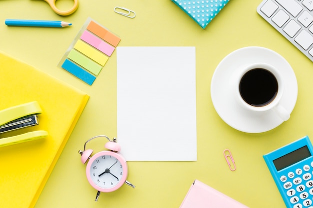 Blank card surrounded by stationery