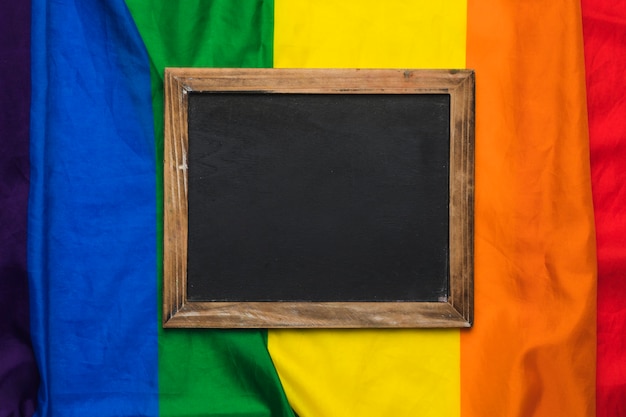 Free Photo blank chalkboard on rainbow flag