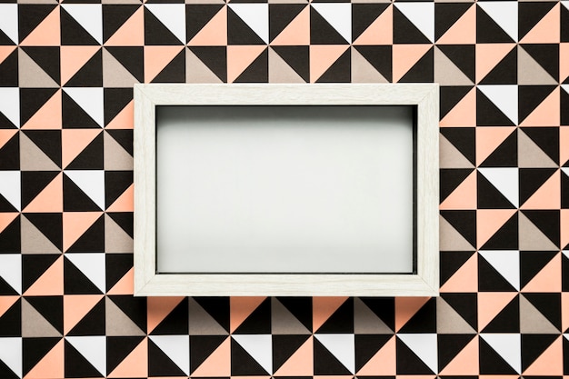 Free photo blank frame on patterned background