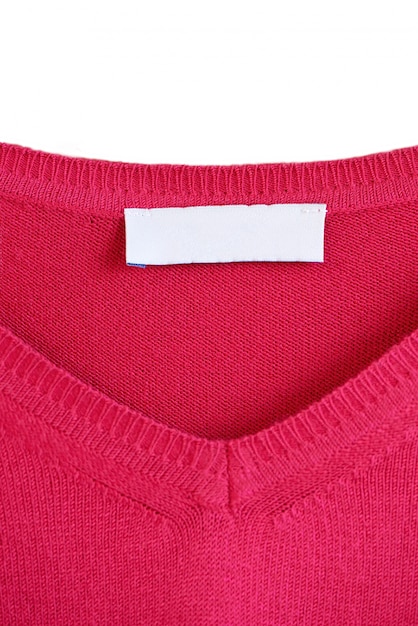 Free photo blank label on a red sweater