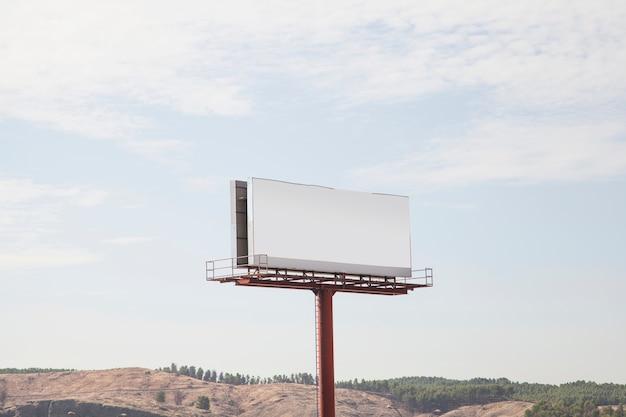 Free photo blank large hoarding billboard against sky