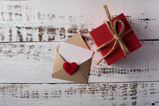 Free Photo blank letter on wood background, valentine's day concept