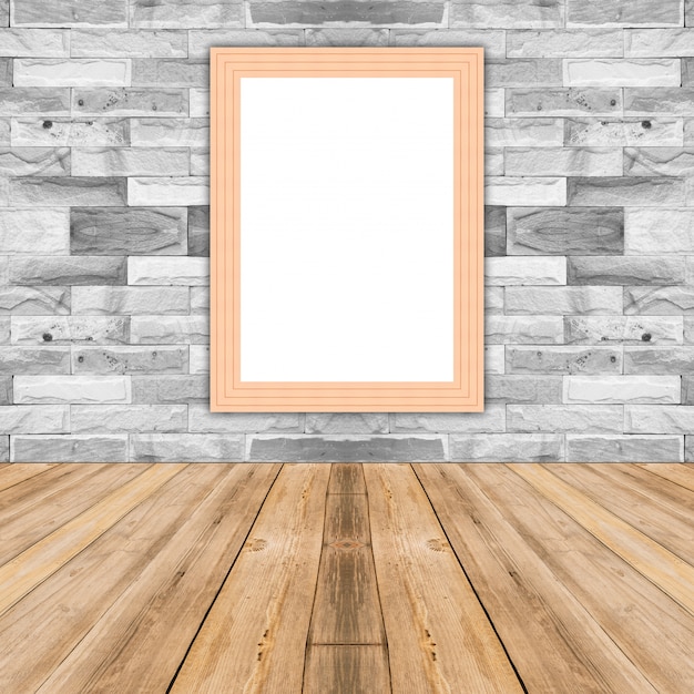 Free photo blank maize wooden photo frame leaning at white brick wall,template mock up for adding your design and leave space beside frame for adding more text.