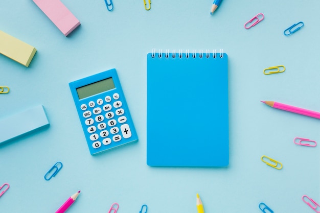 Blank notepad and calculator top view