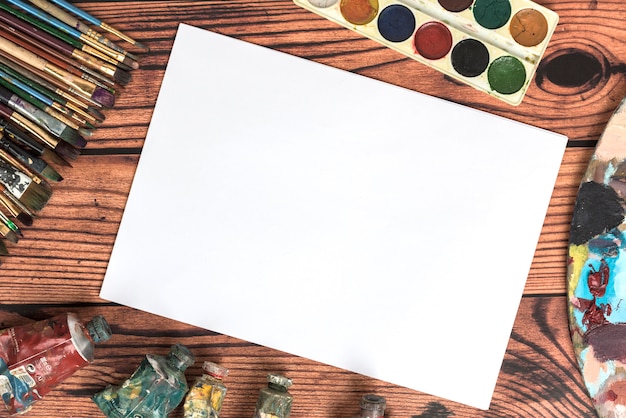 Free Photo blank paper and paint materials