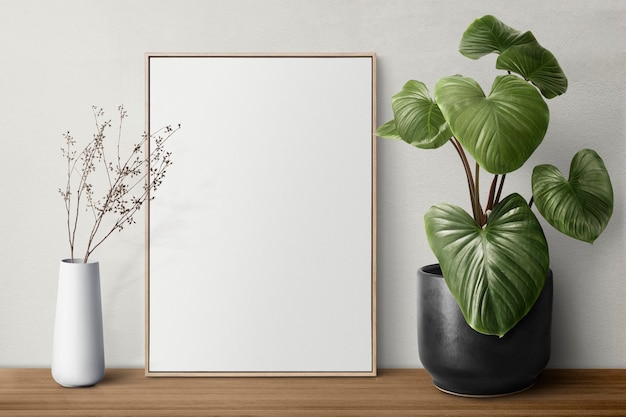 Free Photo blank picture frame on a shelf