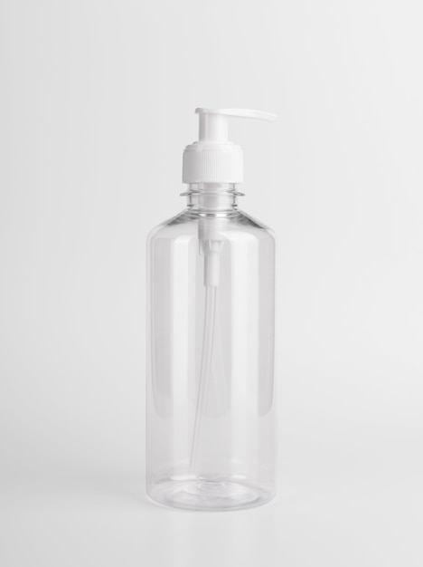 Blank plastic transparent bottle with dispenser airless pump using label and ads for Gel,soap,Alcohol,cream and cosmetics.