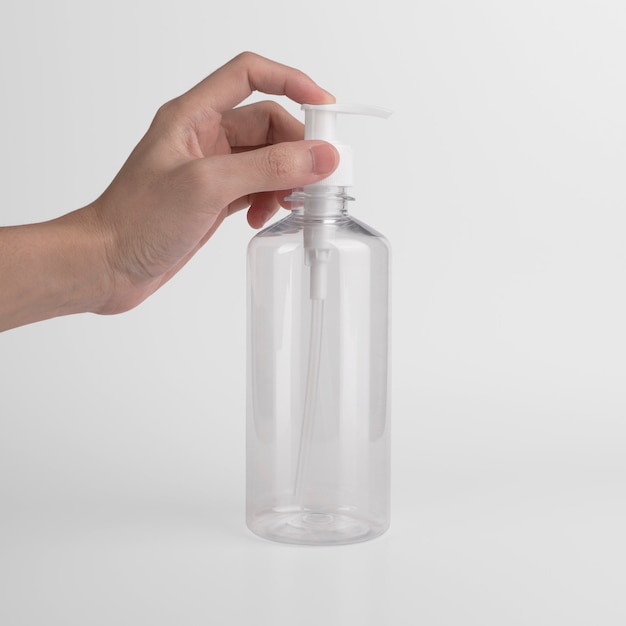 Blank plastic transparent bottle with dispenser airless pump using label and ads for Gel,soap,Alcohol,cream and cosmetics.