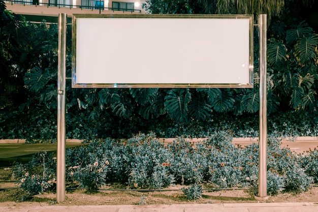 Blank rectangular billboard in the garden