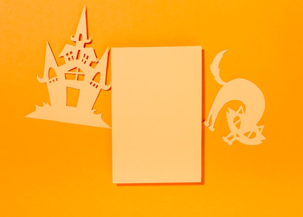 Blank sheet with paper cat and castle