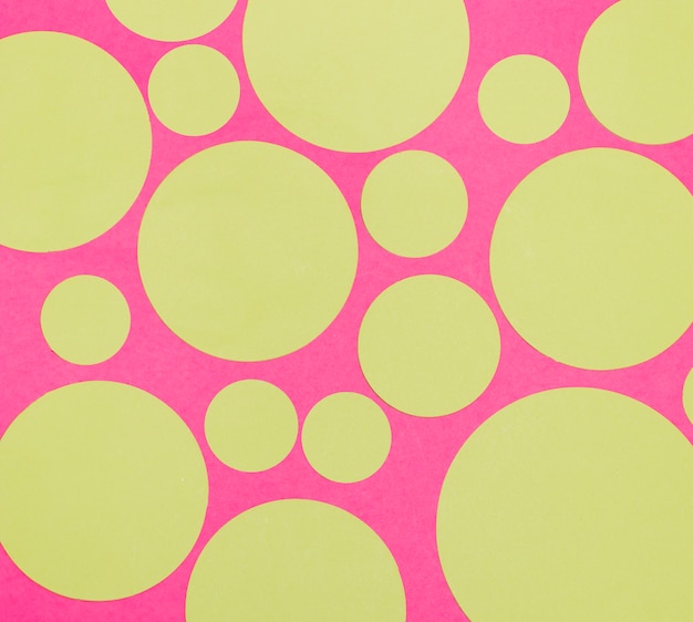 Free photo blank small and big circles on pink background