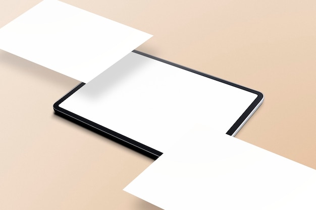 Free photo blank tablet screens on beige background