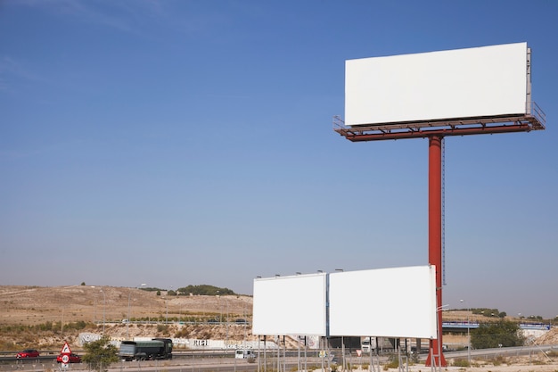 Free Photo blank white billboards near the highway