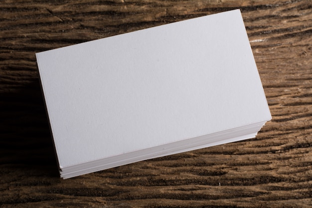 Blank white Business card presentation of Corporate identity on wood background