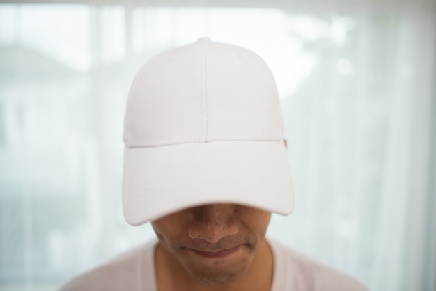 Free photo blank white cap on the head ready for branding.