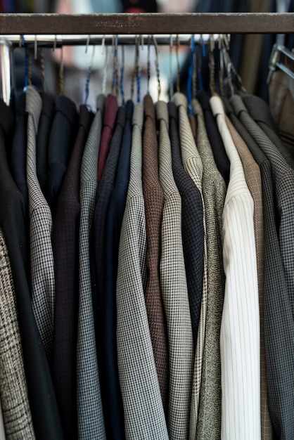 Free photo blazers on hangers at second hand market