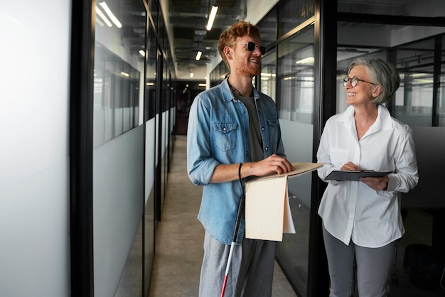 Blind person working at an inclusive office job