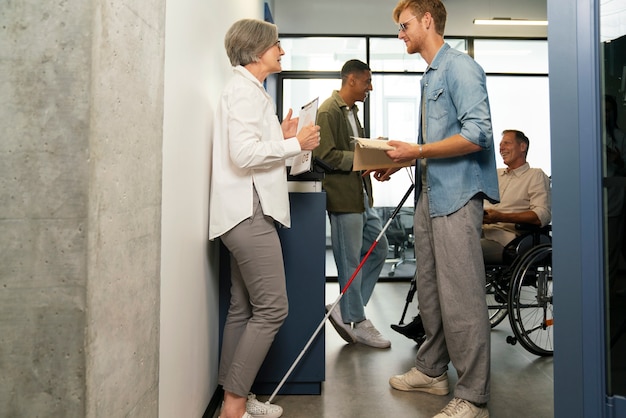 Free photo blind person working at an inclusive office job