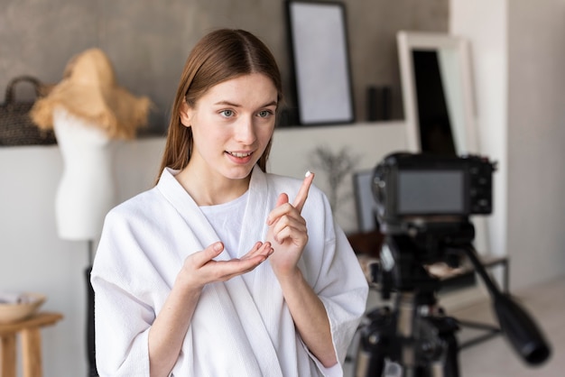 Blogger recording video from home