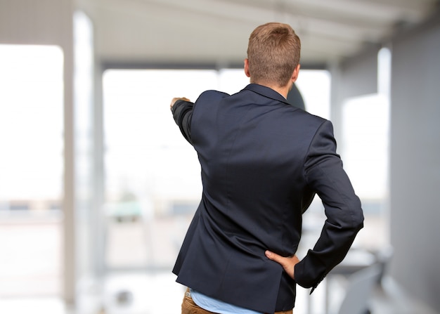 Free photo blond businessman angry expression