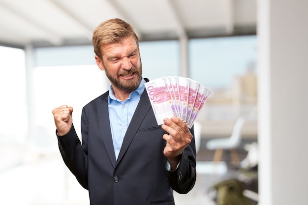 blond businessman happy expression