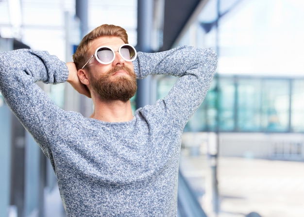 Free Photo blond hipster man. happy expression