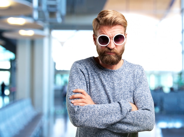 Free photo blond man angry expression