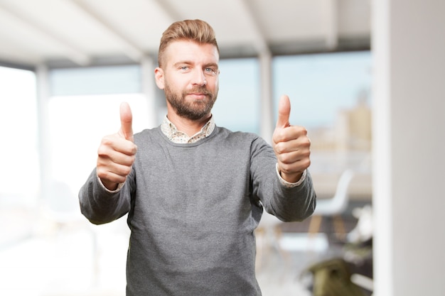 Free photo blond man. happy expression