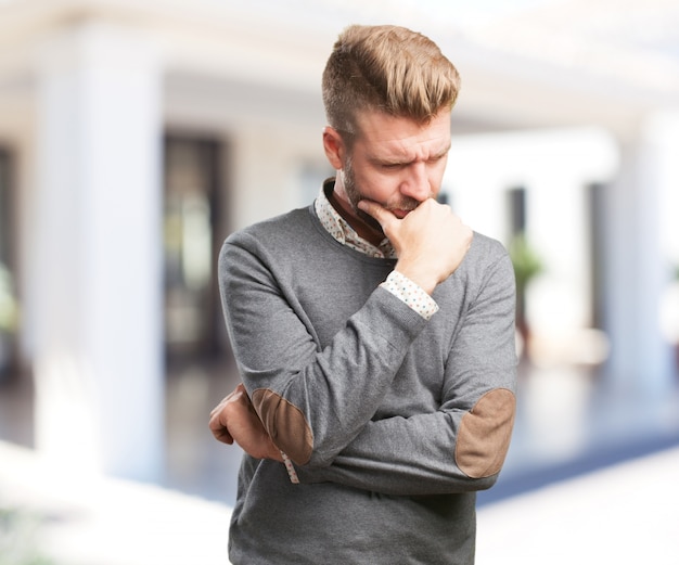 Free Photo blond man worried expression